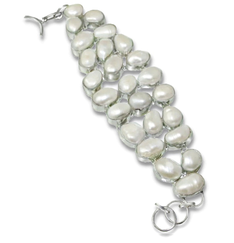 20 Breathtaking Natural Creamy White Biwa Pearls set in .925  Sterling Silver Bracelet