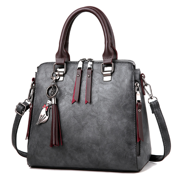 Superior Leather Tassel Cat Charm Handbag in a Super Selection of Colours - BELLADONNA